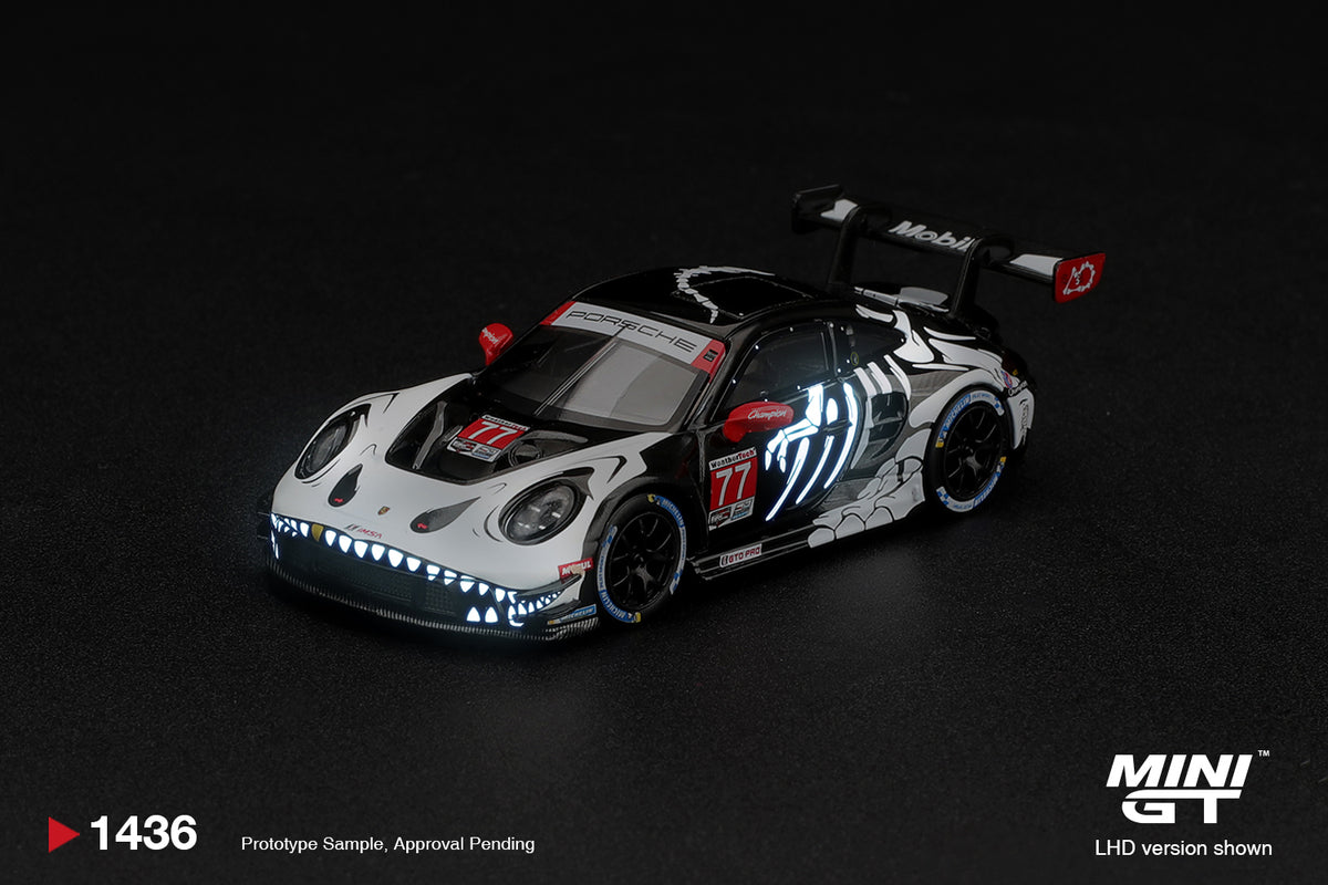 PREORDER: MINI GT #1436 Porsche 911 GT3 R (992) #77 AO Racing “Skeleton Rexy” – 2026 IMSA Petit Le Mans | 1:64 Boxed