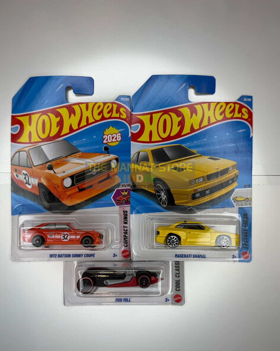 Hot Wheels 2026 L Case 1972 Datsun Sunny Coupé, Maserati Shamal & Mod Mill Set of 3 – Imported 1:64 Scale Die-Cast Cars